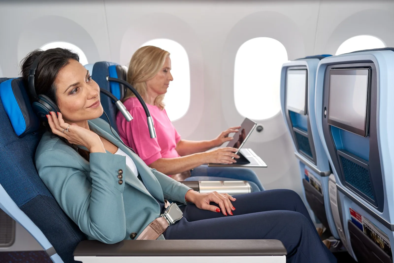 KLM cabin interior, representative of family and small-group itineraries where pooled Flying Blue miles unlock value.