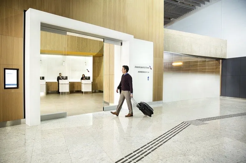 Airline lounge entrance with premium seating and exclusive access