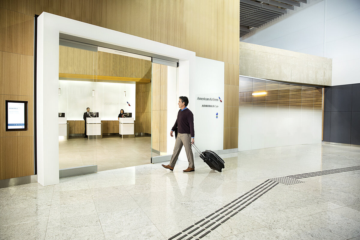 Airline lounge entrance with premium seating and exclusive access
